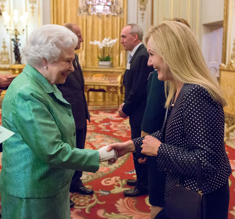 Dr Victoria Edwards attends reception at Buckingham Palace